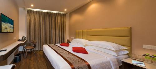 Una cama o camas en una habitación de CR Grande