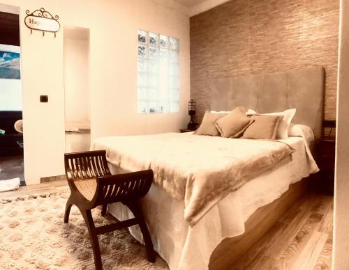 En eller flere senge i et værelse på SUNSET IN LOFT