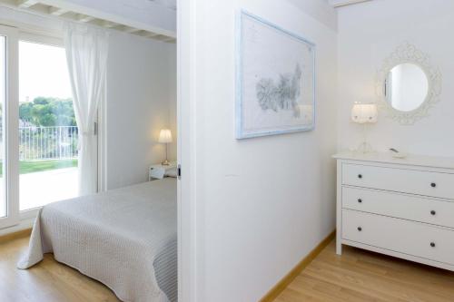 Ένα ή περισσότερα κρεβάτια σε δωμάτιο στο Rio Marina Charme e Relax