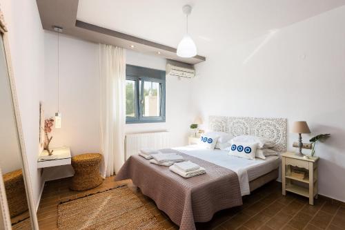 Voodi või voodid majutusasutuse Inn Villa, impeccable location, By ThinkVilla toas