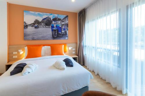 เตียงในห้องที่ 7 Days Premium Hotel Don Meaung Airport