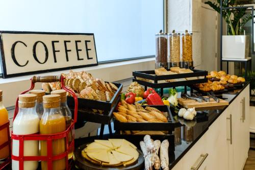 a buffet with various types of food and drinks at Clement Barajas in Madrid