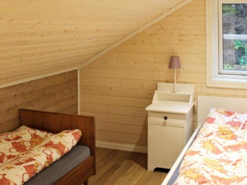 מיטה או מיטות בחדר ב-4 star holiday home in Sømna