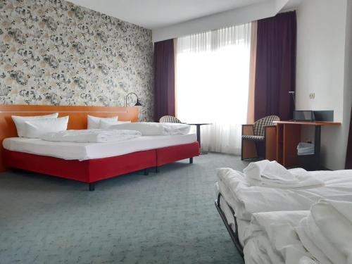 Postel nebo postele na pokoji v ubytování Good Morning + Leipzig