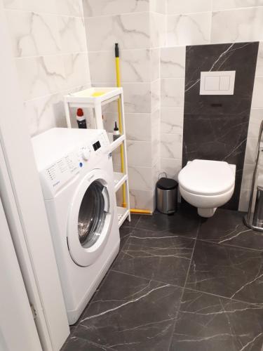 Koupelna v ubytování Vena apartment