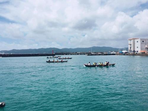 a group of boats in a large body of water at Sakai Guest House AMAMI（堺ゲストハウス奄美） in Setouchi