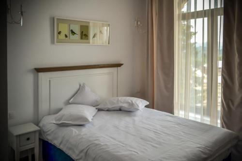 Katil atau katil-katil dalam bilik di Hotel Coquette