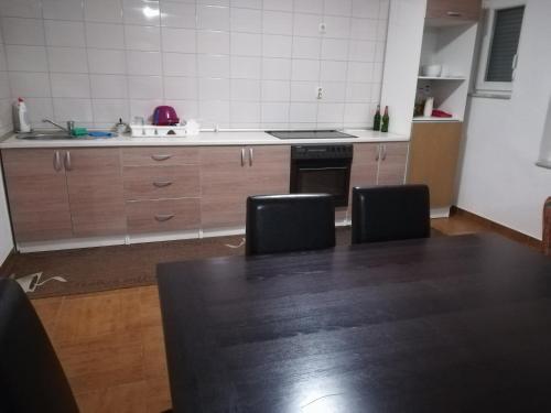 Kuchyň nebo kuchyňský kout v ubytování Apartman Jurak