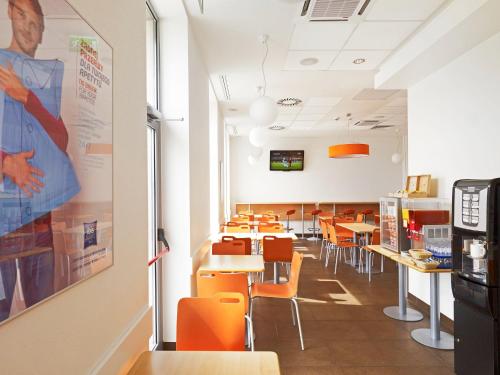 Телевизор и/или развлекательный центр в ibis budget Krakow Stare Miasto