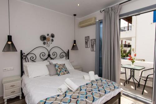 Krevet ili kreveti u jedinici u okviru objekta Naxos Enjoy Apartments