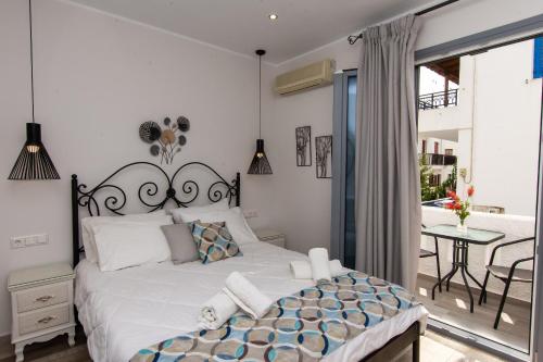 Lova arba lovos apgyvendinimo įstaigoje Naxos Enjoy Apartments