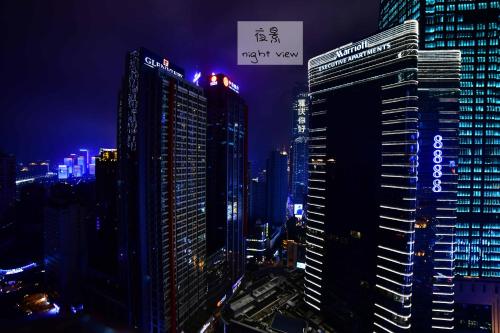 a city skyline at night with tall buildings at 弱水咖啡国际青旅 Only Cafe and Backpacker in Chongqing