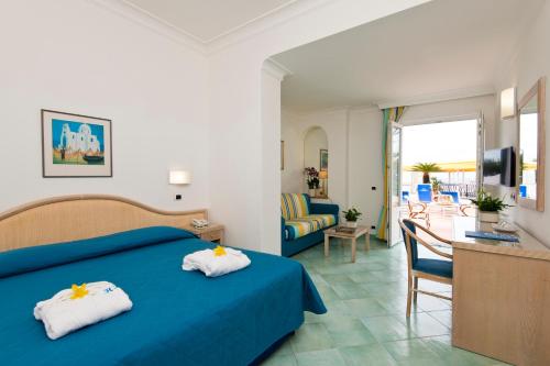 Postel nebo postele na pokoji v ubytování Hotel Floridiana Terme