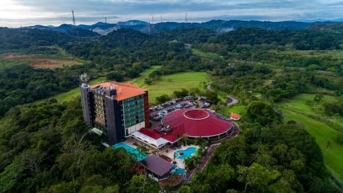 an overhead view of a hotel with a red roof at Summit Rainforest Golf Resort & All Inclusive in Paraíso