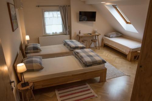 Кровать или кровати в номере Bed & Breakfast Dvorec
