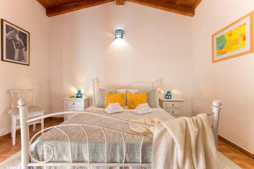 Postel nebo postele na pokoji v ubytování Bioagriturismo NURE