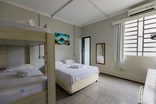 En eller flere senger på et rom på Hotel Meireles
