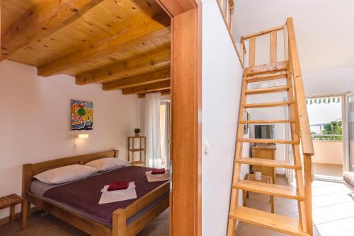 Postel nebo postele na pokoji v ubytování Apartments Holiday near beach