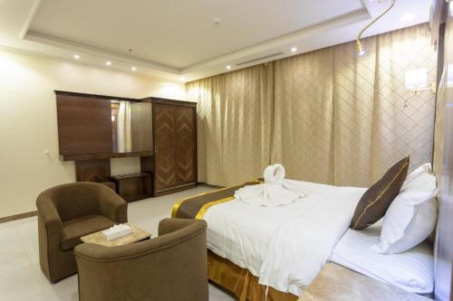 Postel nebo postele na pokoji v ubytování Al Mokhtar 2 Furnished Units
