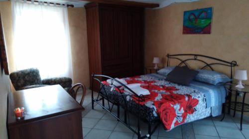 Tempat tidur dalam kamar di Bed and Breakfast Giaveno Rio