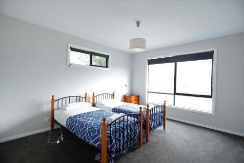 Katil atau katil-katil dalam bilik di Apollo Bay Seal Apartments