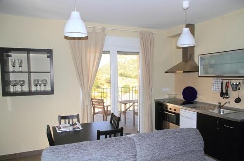 Η κουζίνα ή μικρή κουζίνα στο Apartamentos Turísticos Rurales Monte de las Ánimas