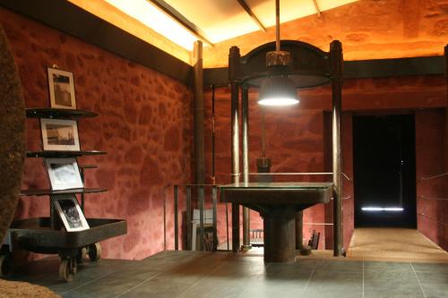 a bathroom with a sink and a mirror at Estabulo de Valinhas in Vitorino dos Piães