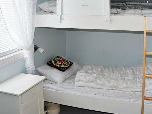 Llit o llits en una habitació de Holiday Home Hansbakken