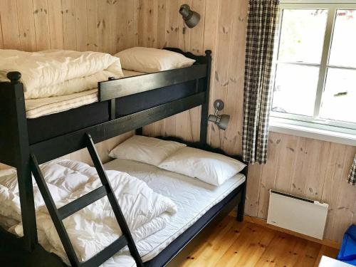 Katil dua tingkat atau katil-katil dua tingkat dalam bilik di Apartment Skulestadmo