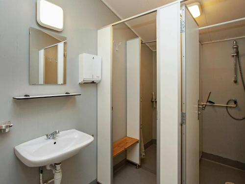 a bathroom with a sink and a shower at Spacious Retreat by Limfjorden - By Traum Ferienwohnungen in Sillerslev