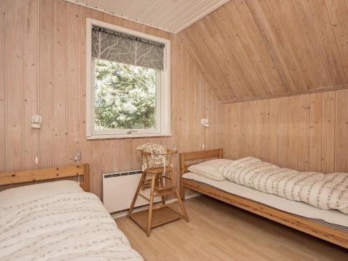 Postel nebo postele na pokoji v ubytování 6 person holiday home in Nørre Nebel-By Traum