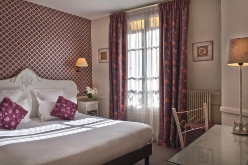 Katil atau katil-katil dalam bilik di Hôtel de la Motte Picquet