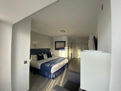 Postel nebo postele na pokoji v ubytování Honeymoon Apartments