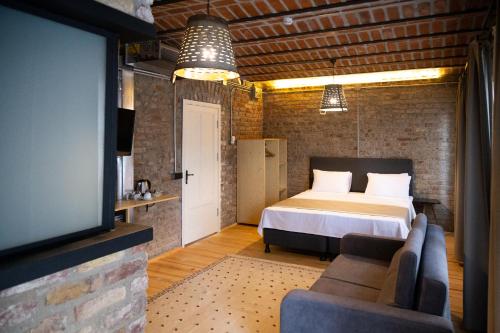 Llit o llits en una habitació de Novus Pera Hotel