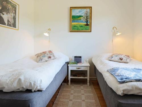 Postelja oz. postelje v sobi nastanitve One-Bedroom Holiday home in Ullared