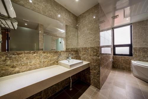 Sunrise Hotel Seongsan tesisinde bir banyo