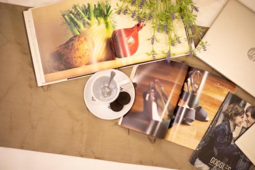 a wall with a picture of vegetables and a plate of food at HotSpot @ City Centre by SSVC in Kota Kinabalu