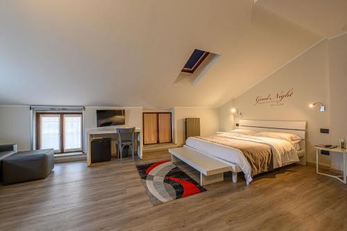 Postel nebo postele na pokoji v ubytování Hotel & Apartments " Perpoin "