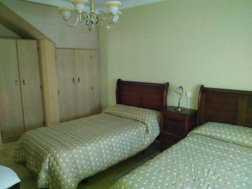 Säng eller sängar i ett rum på Casa Rural La Infanta