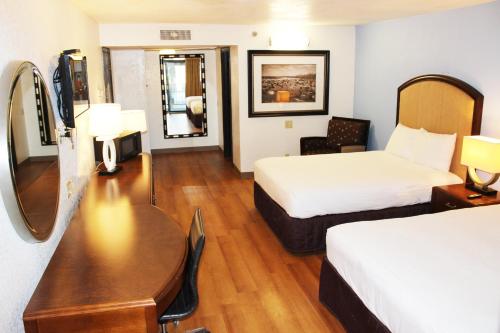 Ένα ή περισσότερα κρεβάτια σε δωμάτιο στο 7 boutique hotel