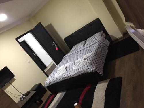 Ένα ή περισσότερα κρεβάτια σε δωμάτιο στο HotelWhite