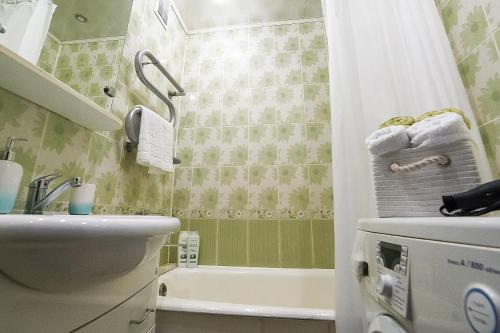 Et badeværelse på PaulMarie Apartments on Molodeznaya