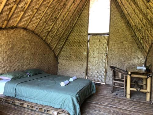 Posteľ alebo postele v izbe v ubytovaní Bamboo & B