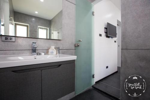 a bathroom with a sink and a mirror at Villa Azur, 4 Bedrooms, Ocean View in Chaweng