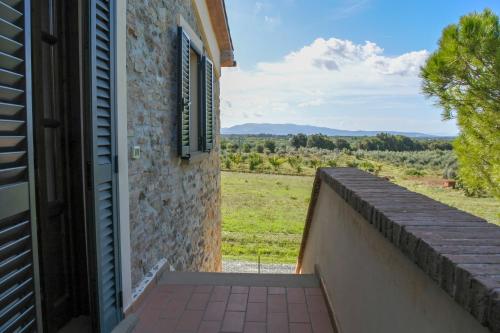 a view from the balcony of a house at Poggio Picchio in Bibbona
