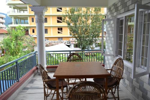 Un balcon sau o terasă la Hotel Global Inn