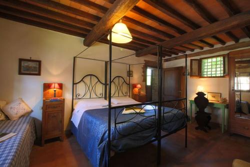 Tempat tidur dalam kamar di Fattoria Di Cavaglioni