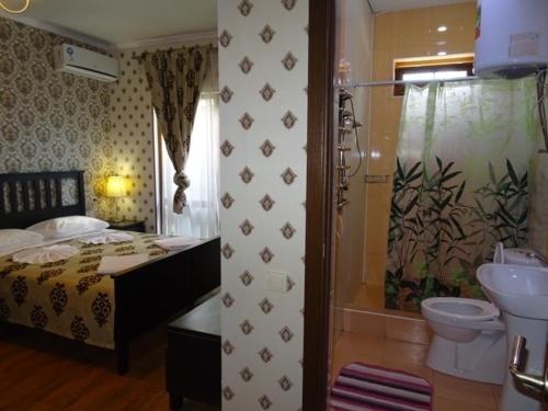 Ванная комната в Отель Медовый