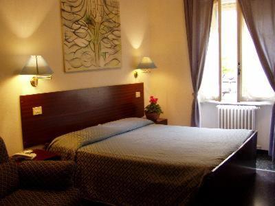 Postel nebo postele na pokoji v ubytování Albergo Villagrande