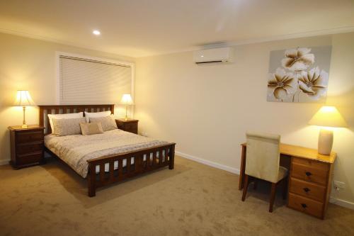Postel nebo postele na pokoji v ubytování Silver House - Melbourne Airport Accommodation - 7 Minutes from Melbourne Airport